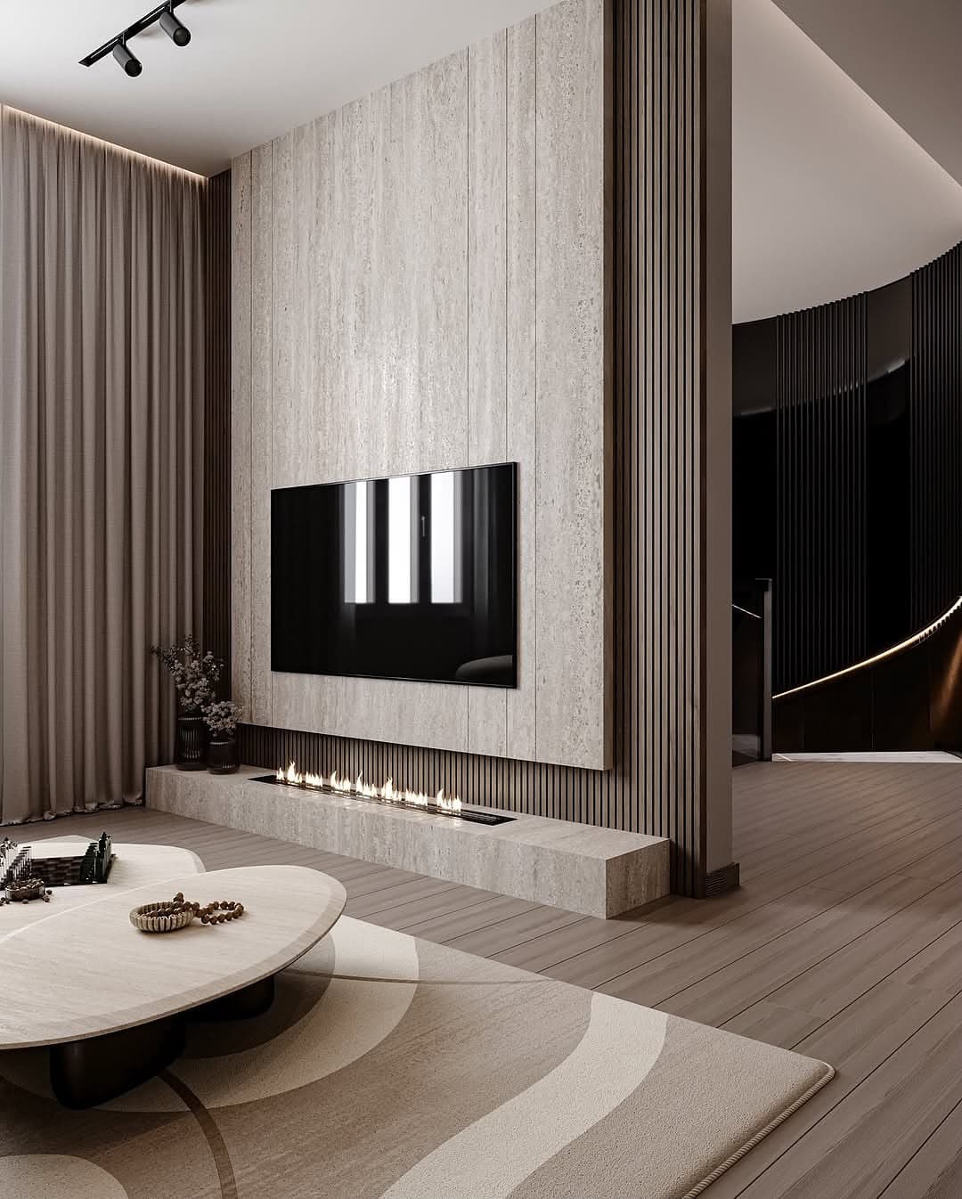 Double-height living room with a stone TV wall, linear fireplace and floor-to-ceiling curtains