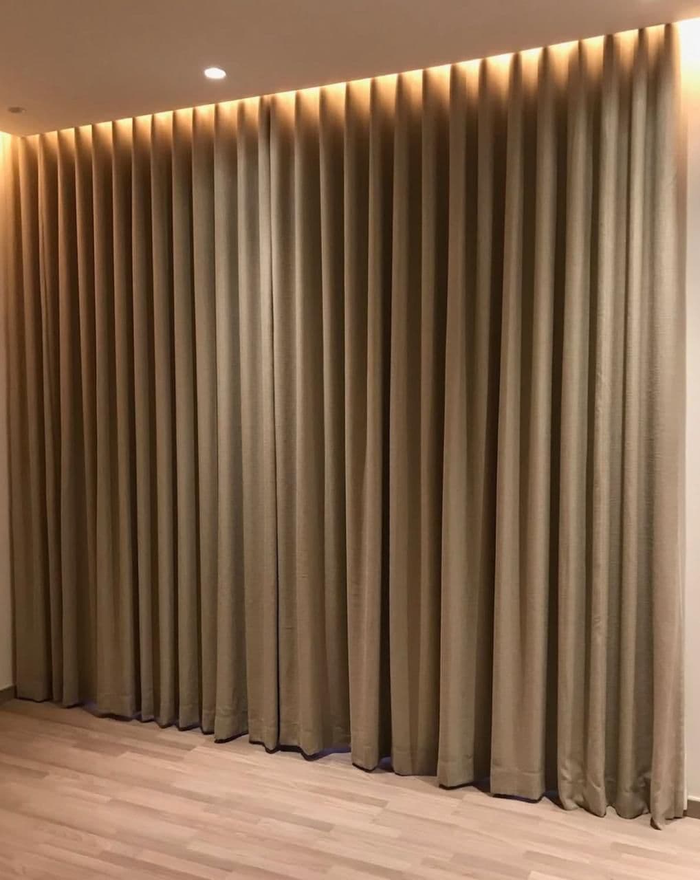 Living room interior design with floor-to-ceiling curtains