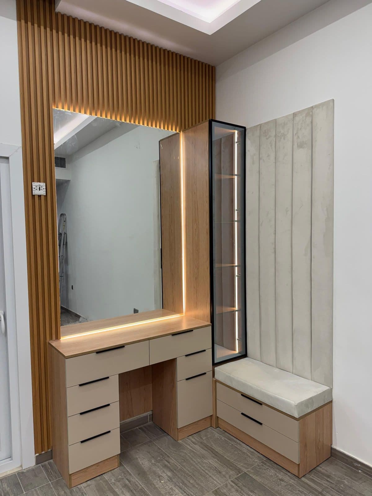 Custom dressing unit with backlit LED mirror and fitted wardrobe